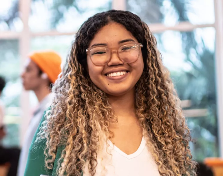 Former homeless youth smiling | Covenant House