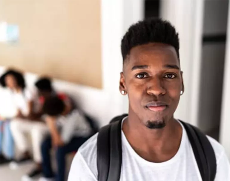 Portrait of a student in the university corridor. Credit: FG Trade | Covenant House