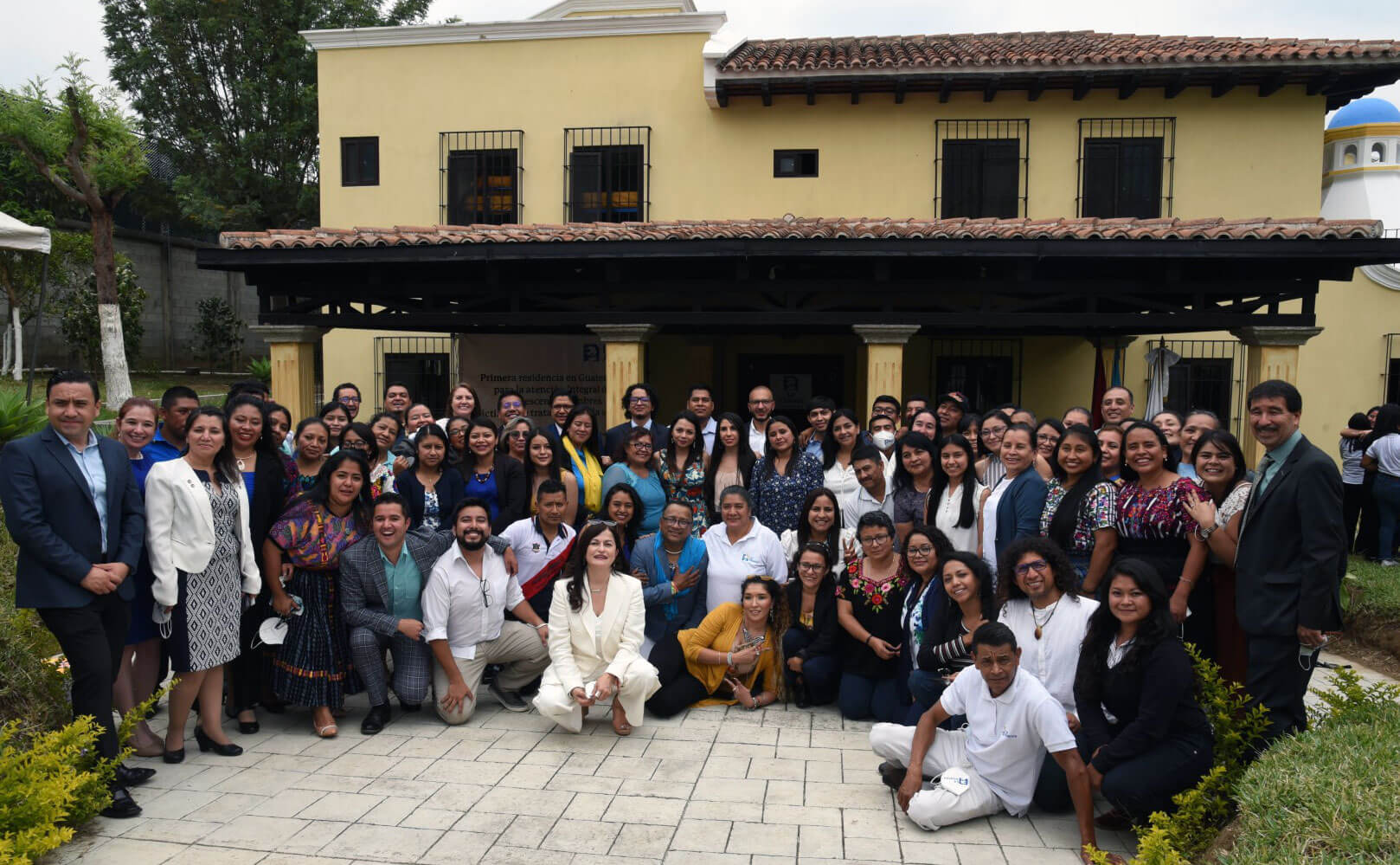 Group photo in front of Covenant House New Boys Residence in Guatemala 