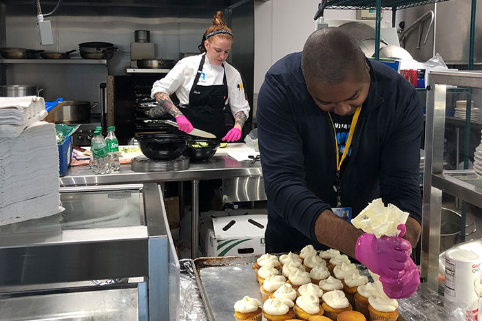 Chefs baking at Covenant House Michigan Kitchen