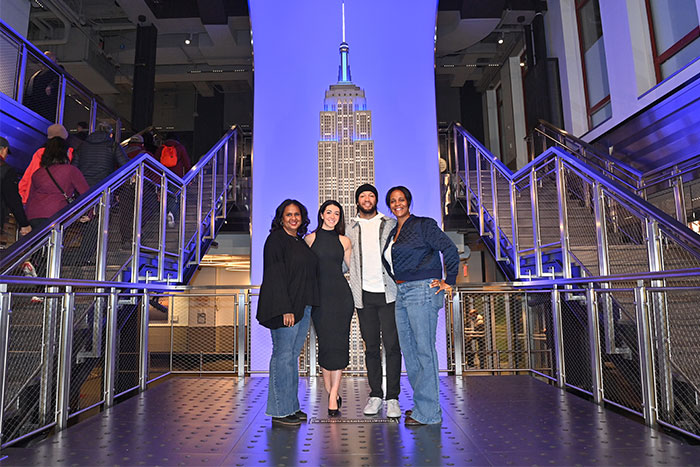Knicks player Jalen Brunson lighting Empire State Building in collaboration with Covenant House