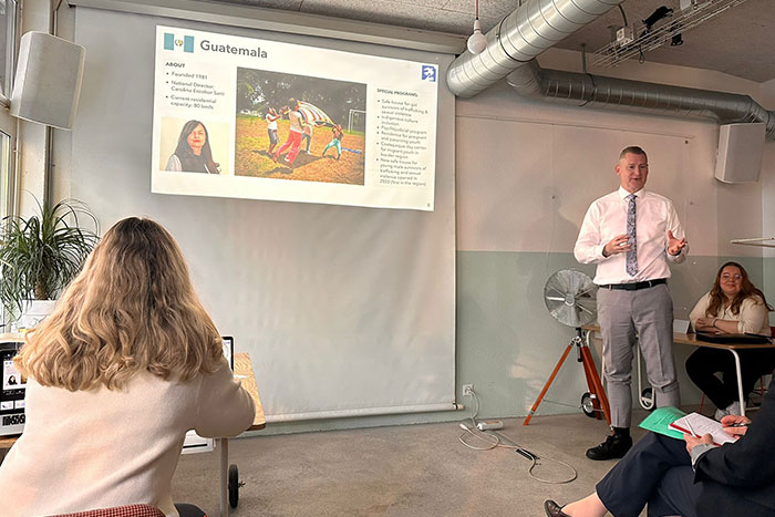 Bill giving a presentation on Guatemala at Casa Alianza Suisse | Covenant House