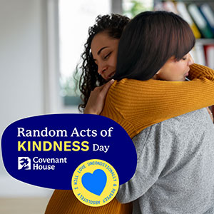 Image of former homeless youth hugging for Facebook Social Post | Covenant House - Random Acts of Kindness Day 