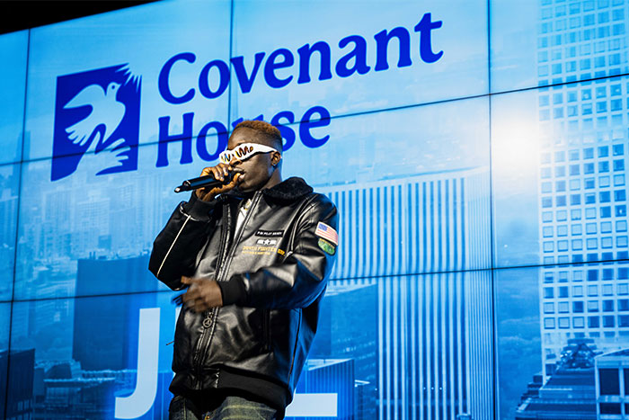 Homeless youth singing at mental health music showcase and panel at Republic Records | Covenant House