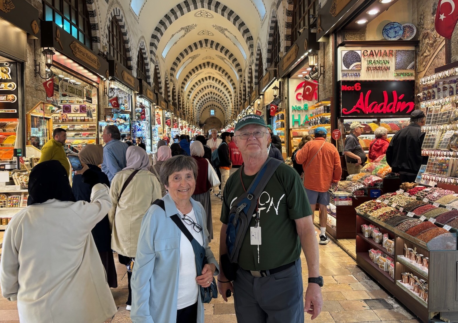 Mary and Tom O'Neill, Covenant House Cornerstone Society members, pause for a photo in a market while touring overseas.