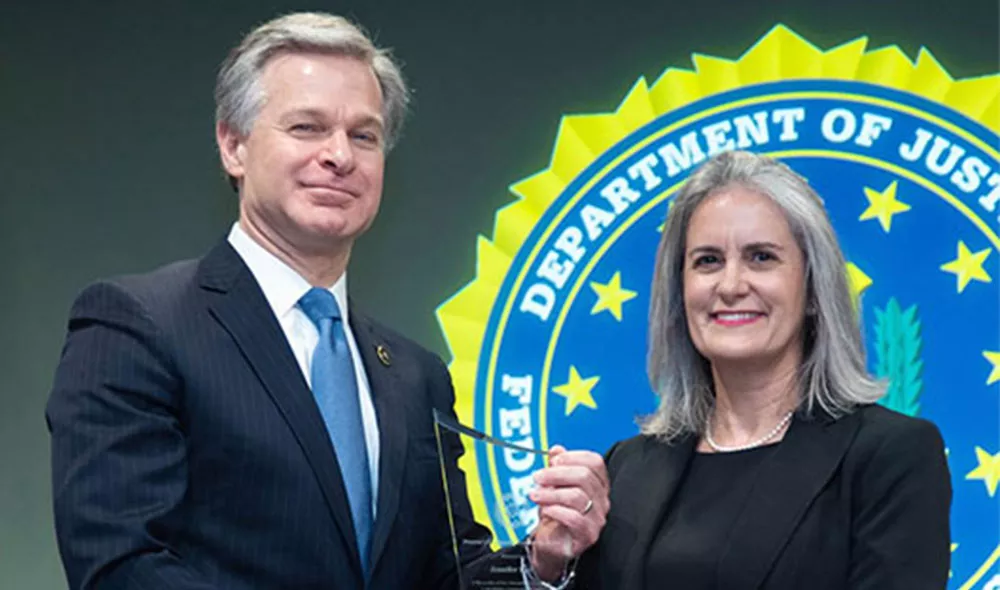 FBI Director Christopher Wray presented Jennifer Paul Ray with the FBI Director’s Community Leadership Award.
