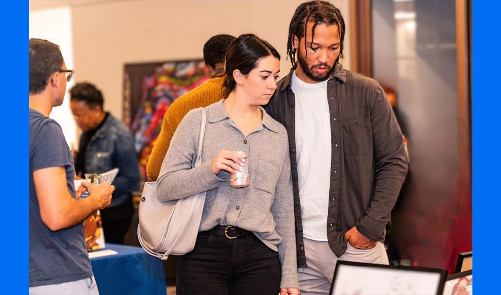Knicks player Jalen Brunson at Covenant House New York Youth Art Show