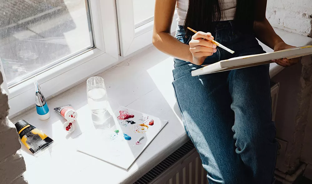 previously homeless youth in need doing art for healing | Covenant House