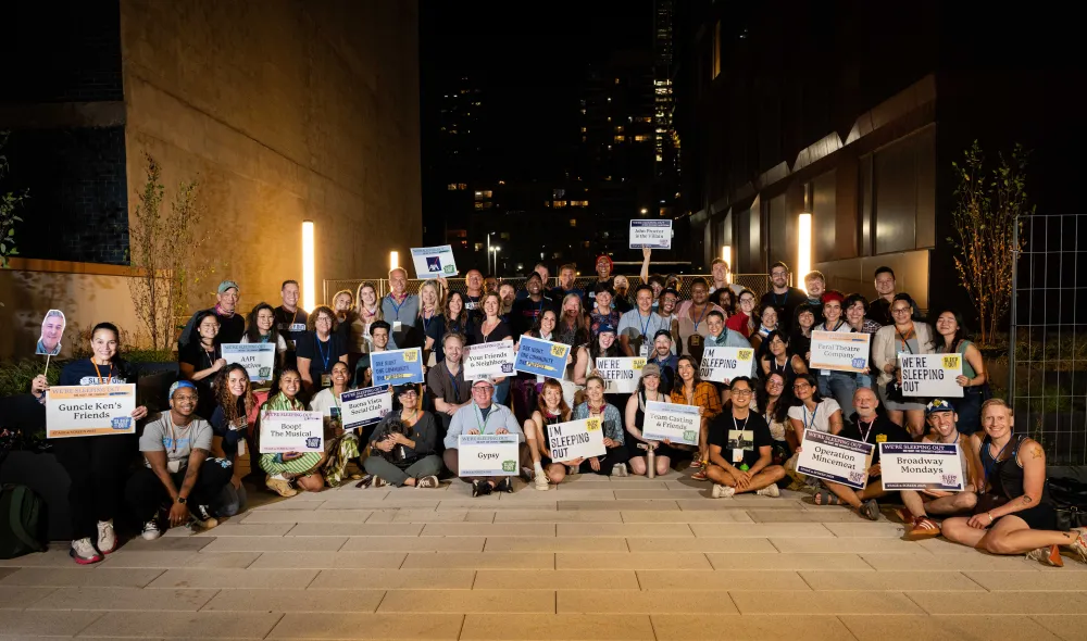 Sleep Out: Stage & Screen participants pause for photo before they Sleep Out on the terrace at Covenant House New York.