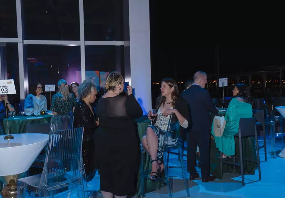 Guests mingling at Night of Covenant House Stars 2024 reception at Javits Center