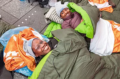 Covenant House Sleep Out volunteers in sleeping bags | Raising funds and awareness for homeless youth