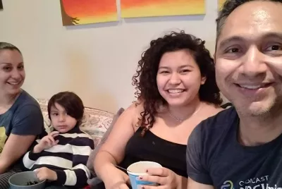 Covenant House alumni Carlos and family