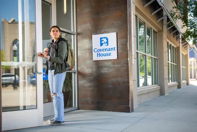 Homeless youth entering Covenant House shelter 