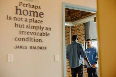 Covenant House Chicago employee talks to a resident in one of their state-of-the-art facilities.