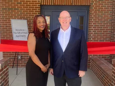 Former CEO Kevin Ryan with Covenant House Atlanta Hero at the celebratory ribbon-cutting marking the completion of the Gift of Hope apartments