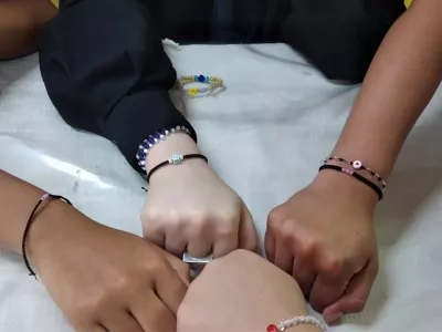 Covenant House youth hands together