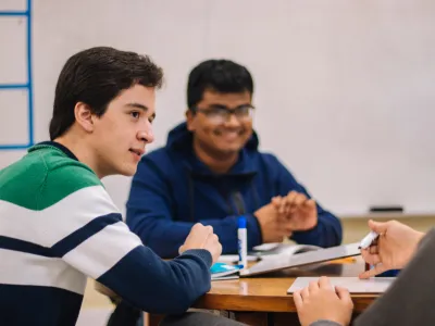 Young people discussing the workforce development program at Covenant House Greater Washington.