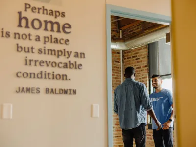 Covenant House Chicago employee talks to a resident in one of their state-of-the-art facilities.