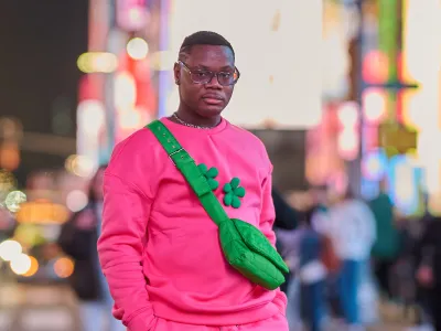Mark, a former Covenant House New York resident, walking throughout Times Square.