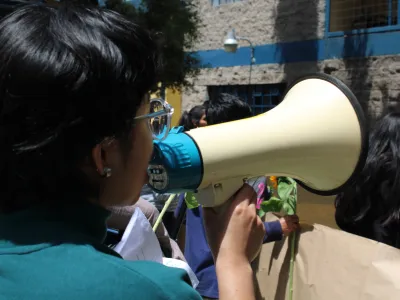 Mateo from Covenant House Guatemala celebrates Pride Month at a street parade.