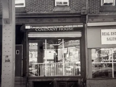 The storefront of Covenant House Pennsylvania's first location in Philadelphia over 25 years ago (in black and white).