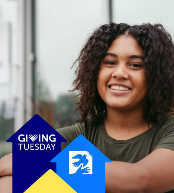 Young formerly homeless girl smiling for GivingTuesday at Covenant House