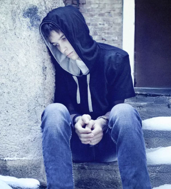 young homeless boy during the winter | Covenant House 3x Match - Donate today to support youth in our care