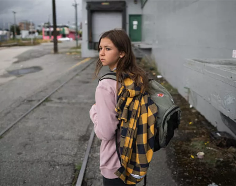 Young homeless girl on the street