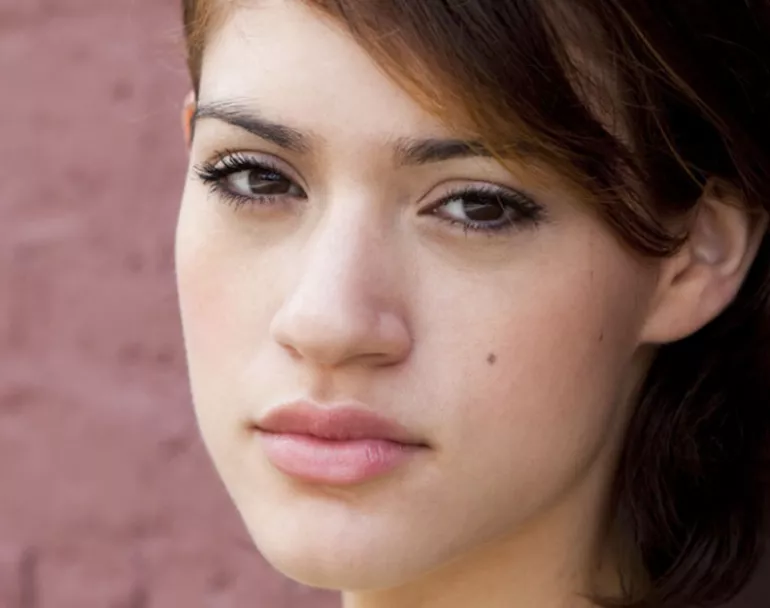 youth leaning against wall staring at you | Covenant House | childrens shelters + teen shelter