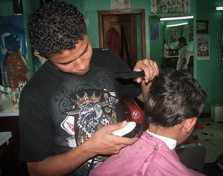 Youth getting haircut in our Covenant House Latin America residential care program