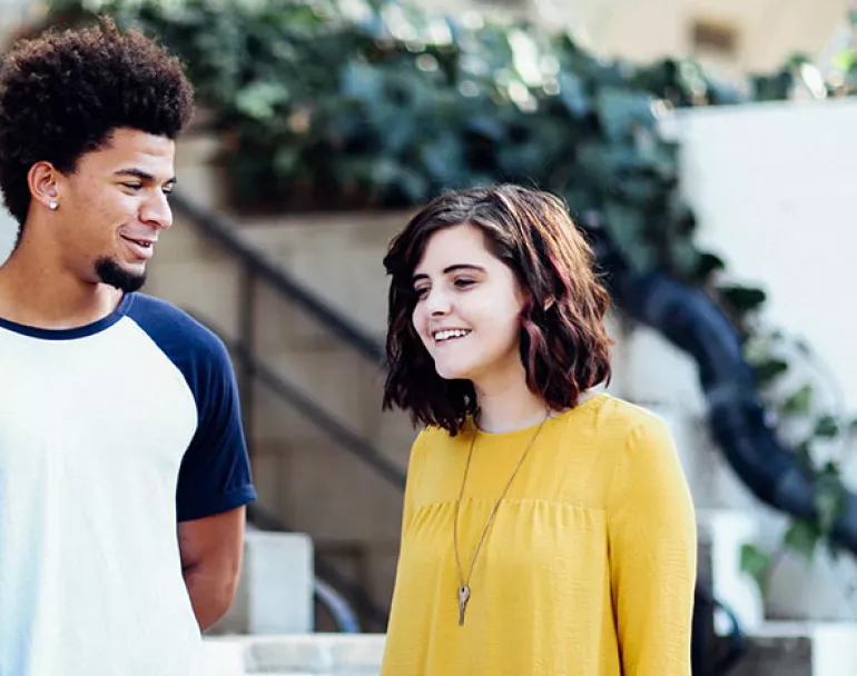former homeless teens interacting outside | Covenant House