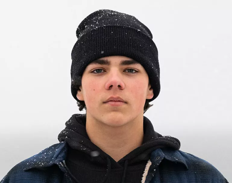 Homeless boy outside during the winter | Covenant House - Donate Today