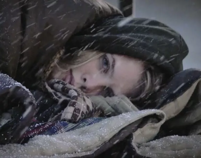 Homeless kid in sleeping bag during the winter | Covenant House - Donate Now for Our 5X Match