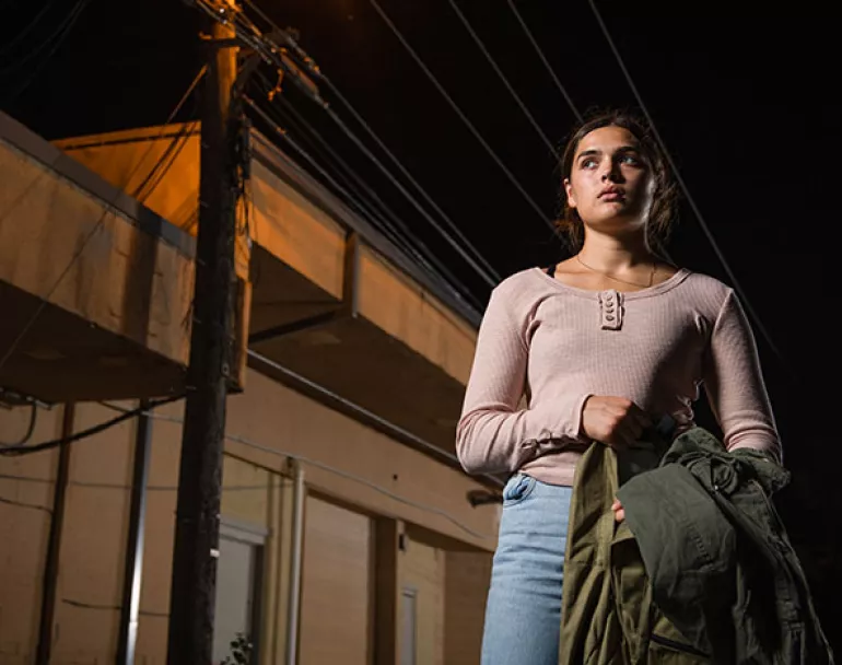Homeless girl alone outside at night | Covenant House - Donate now to help youth in need