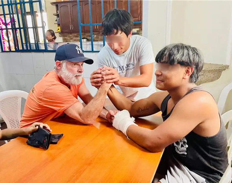 Guatemalan homeless and trafficked youth arm wrestling | Covenant House 