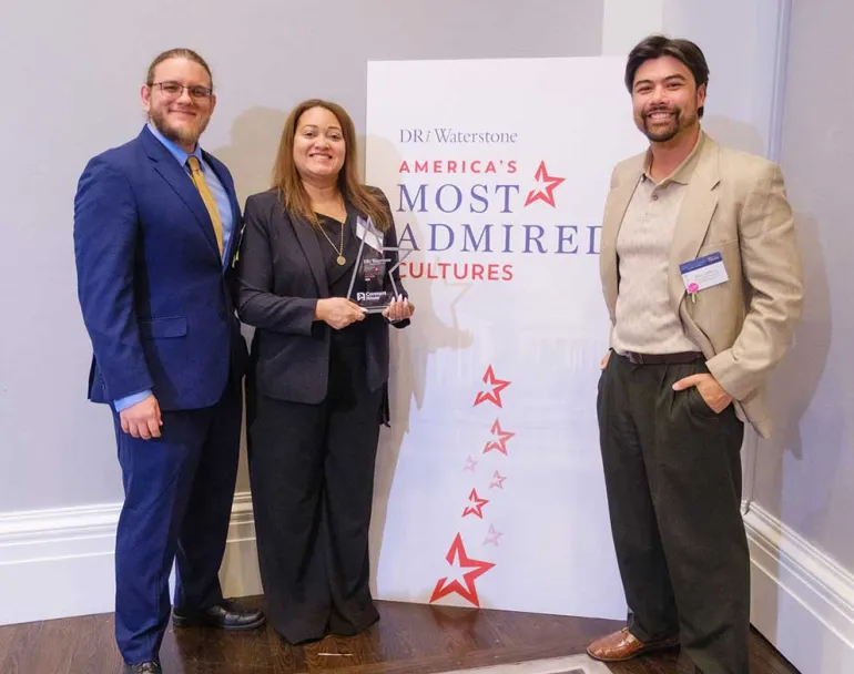 Covenant House staff with America's Most Admired Award