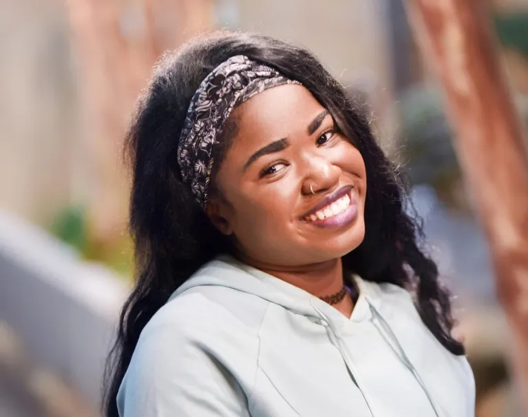 Covenant House Be An Angel Day | former homeless young person smiling